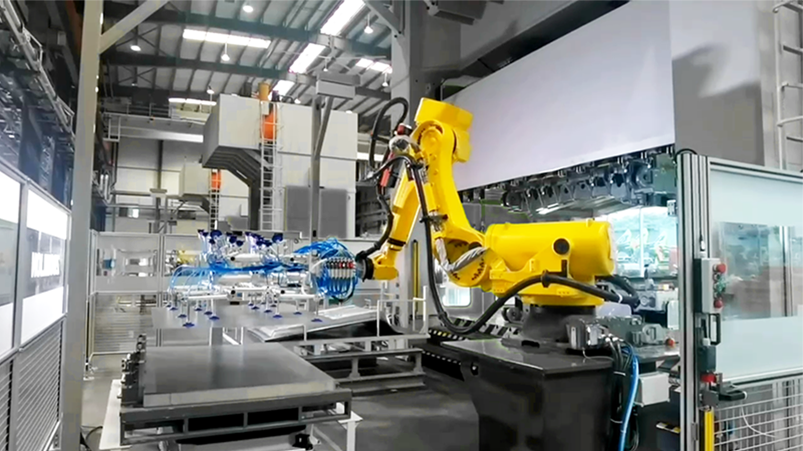 Vision-Guided Loading and Unloading of Sheet Metal Parts