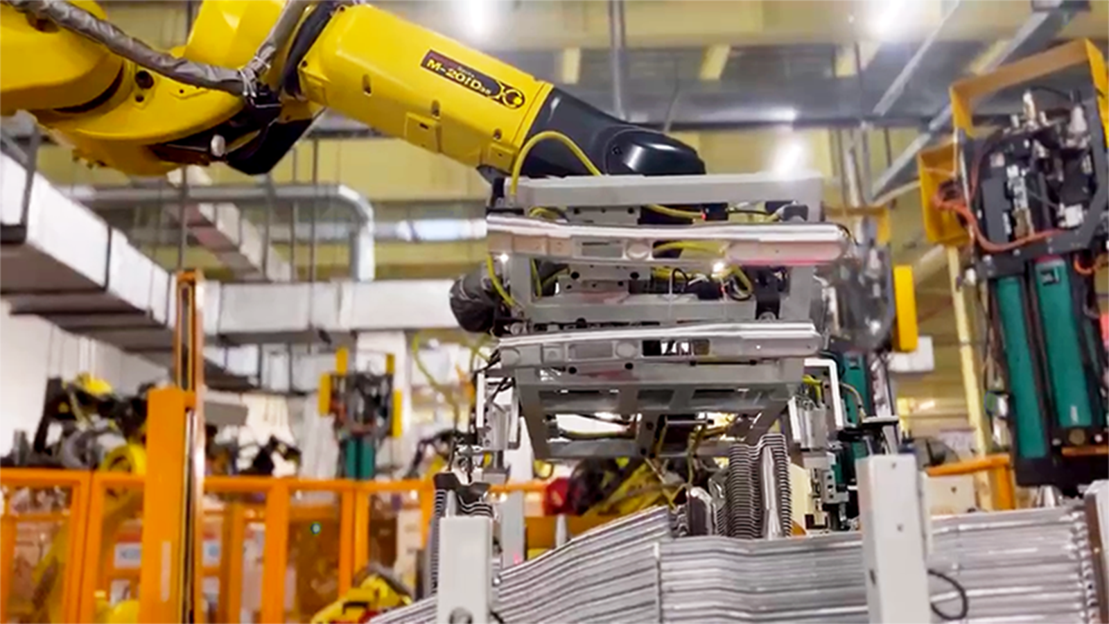 Vision-Guided Loading and Unloading of Stamped Parts