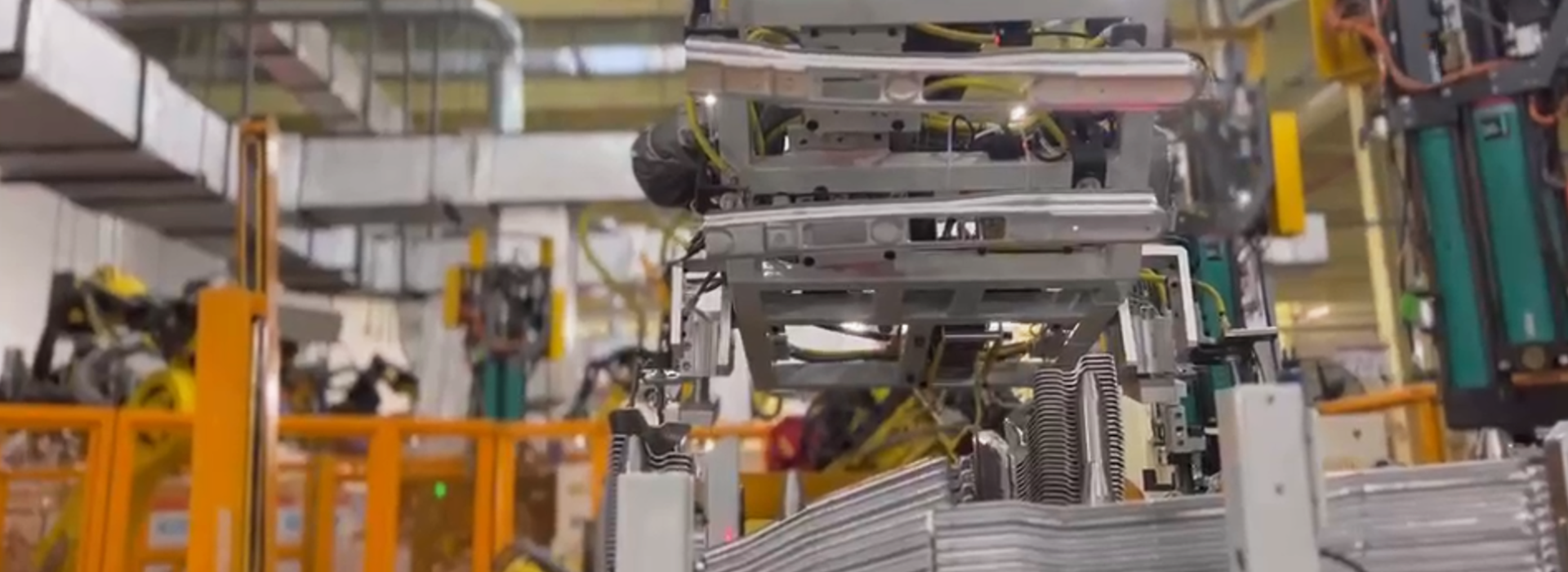 Vision-Guided Loading and Unloading of Stamped Parts