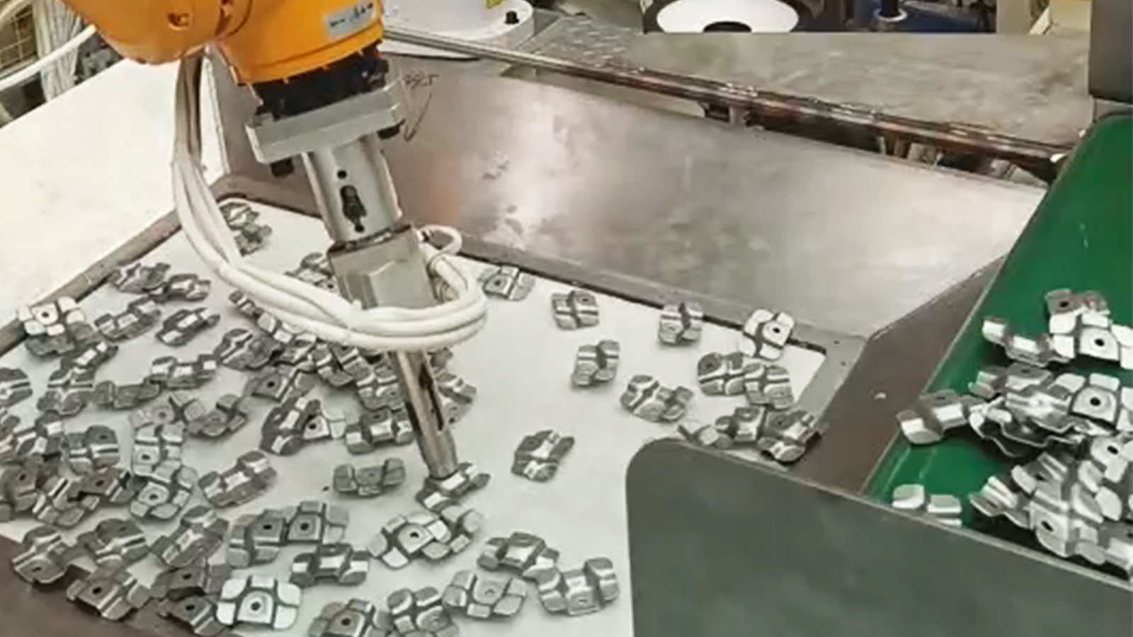 Vision-Guided Unordered Grasping for Nut Welding