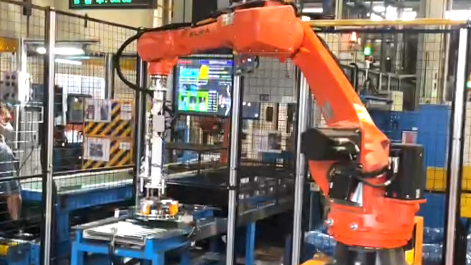 Vision-Guided Loading and Unloading of Brake Discs