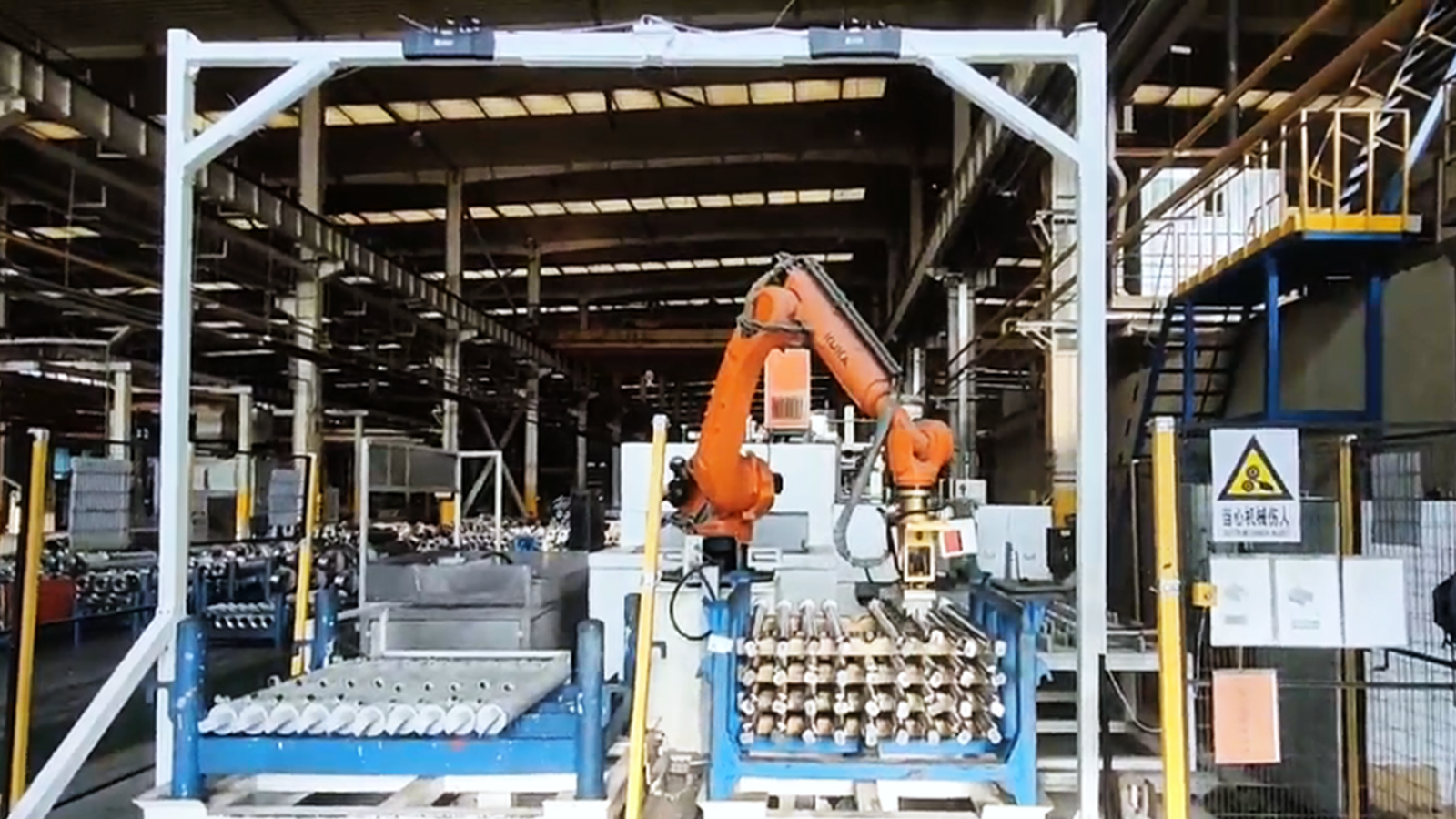 Vision-Guided Loading of Reflective Cylindrical Bars